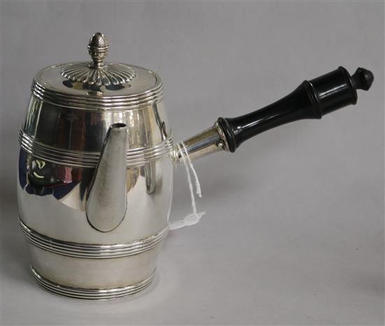 A silver chocolate pot, of barrel form with ebonised handle